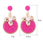 Side view of Earedge circular floral drop earrings highlighting delicate flower details