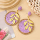 Earedge round leaf pendant earrings displayed alongside matching jewelry pieces