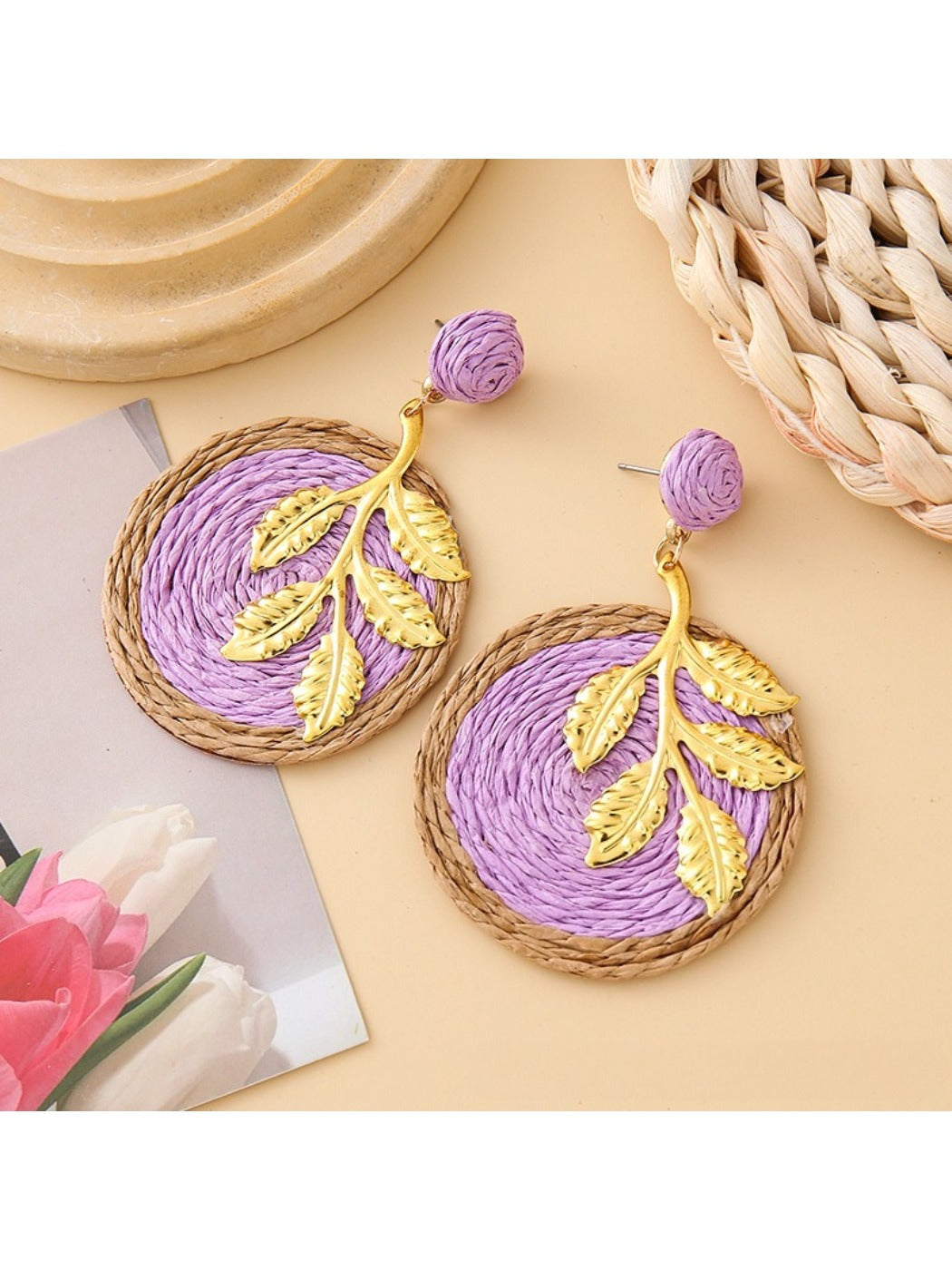 Earedge round leaf pendant earrings displayed alongside matching jewelry pieces
