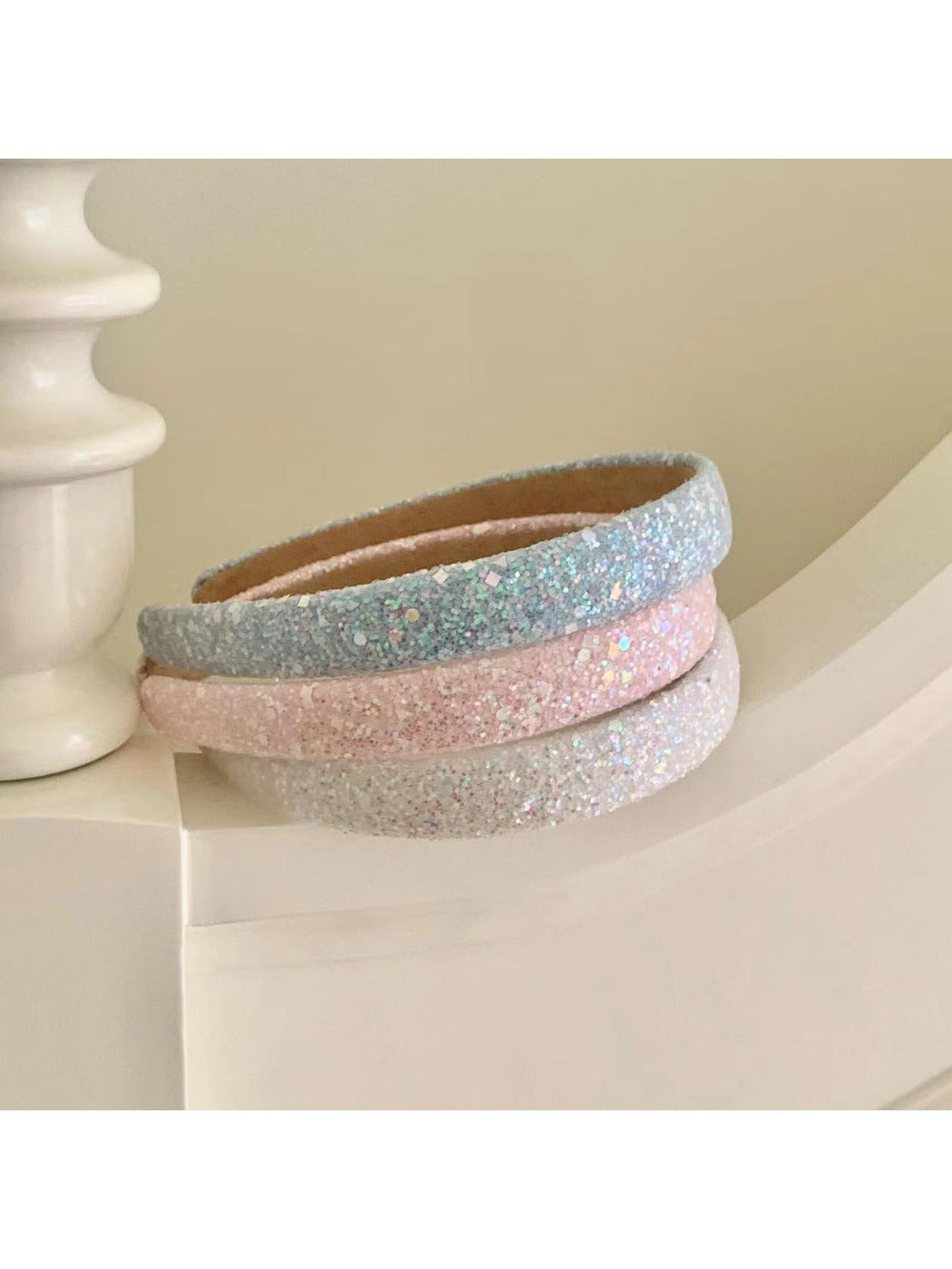 Model wearing Gifty Dreamy Sparkly Sweet Headband with soft pink glitter and bow