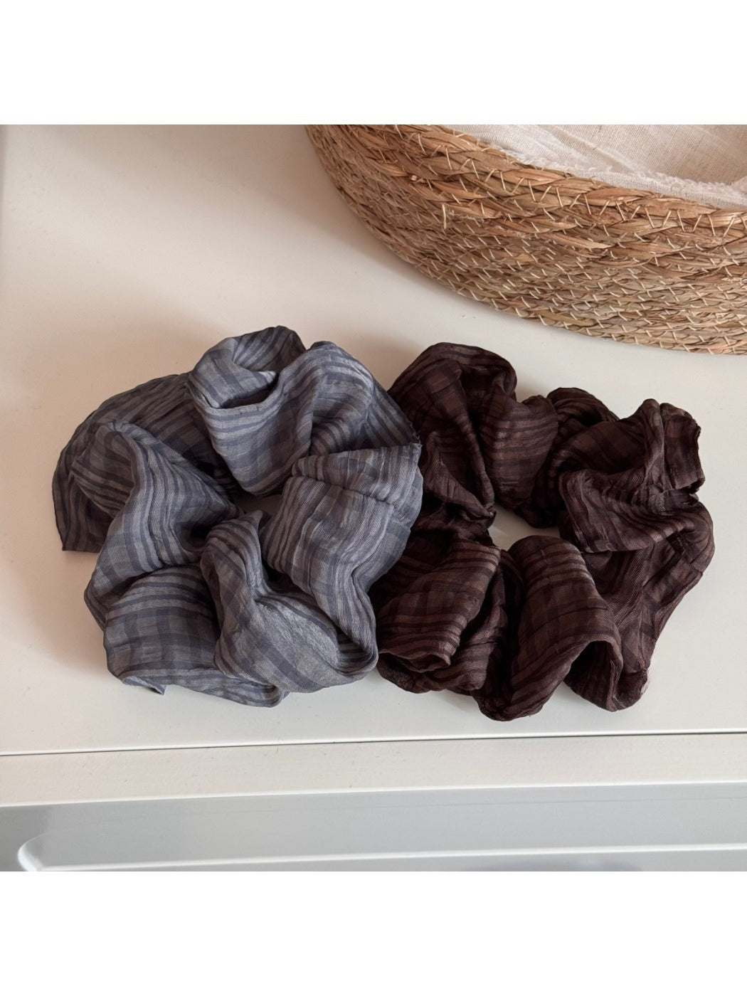 Close-up of Gifty solid color scrunchie showing smooth fabric texture