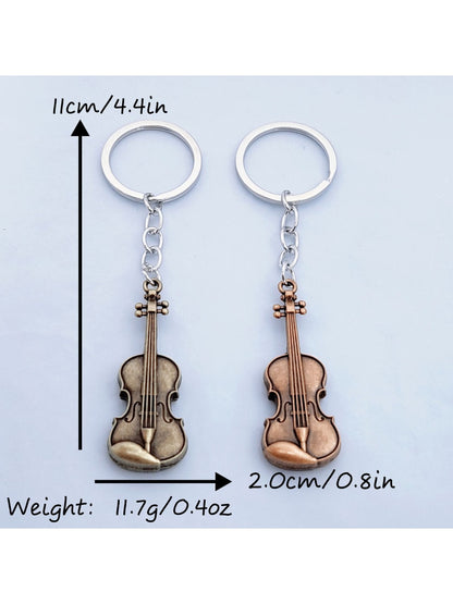 Side view of the vintage guitar keychain highlighting its slim profile and metal finish