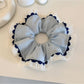 Close-up of Gifty double layer wavy scrunchie showing fabric texture