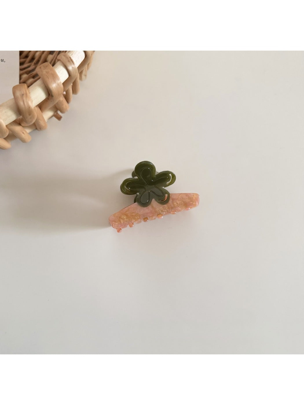Beau flower hair clip styled with casual outfit on a model