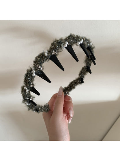 Gifty fluffy headband displayed flat with visible stitching and fabric