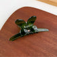 Beau bow adorned hair claw clip shown from angled side view