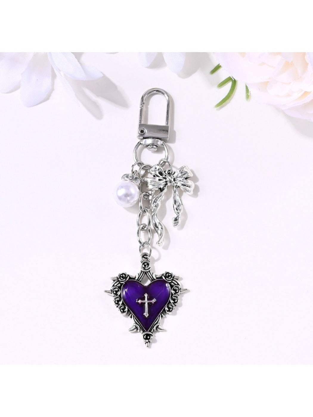 Keychain attached to a set of keys highlighting its size and design