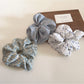 Gifty scrunchie displayed on a white background highlighting colors and texture