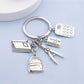 Side view of the alloy backpack book keychain highlighting the clasp