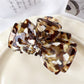 Beau claw clip displayed alongside matching hair accessories