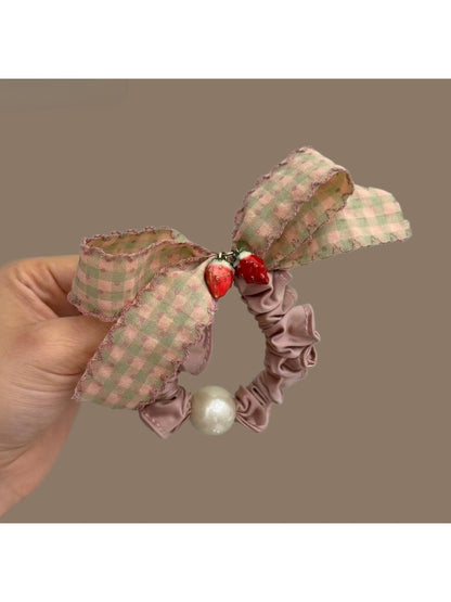 Gifty Sweet Plaid Bow Scrunchie displayed on a white background