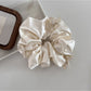 Gifty - Pearlescent Satin Bow Scrunchie