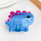 Set of colorful Beau cartoon animal shaped hair claw clips displayed together