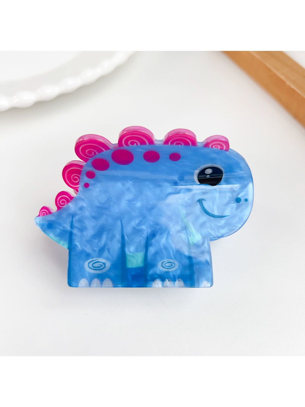 Set of colorful Beau cartoon animal shaped hair claw clips displayed together