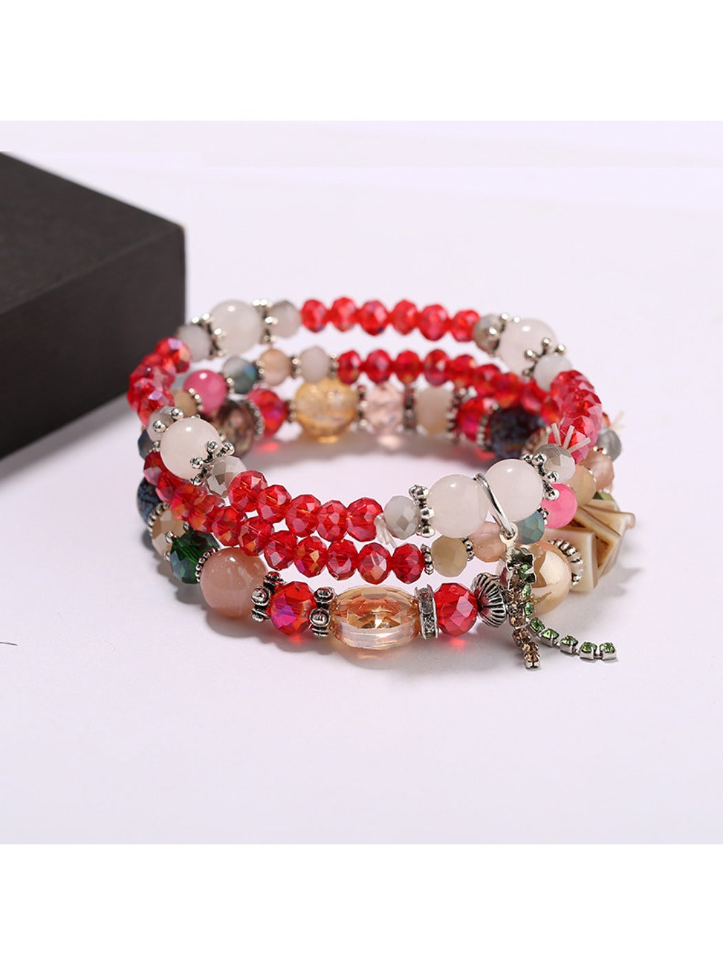 Model wearing Lovra elegant multi-row beaded bracelet on wrist