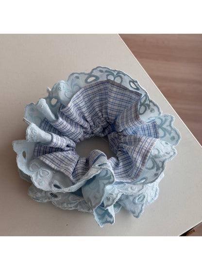 Gifty lace scrunchie styled with casual outfit, illustrating its versatile accessory appeal
