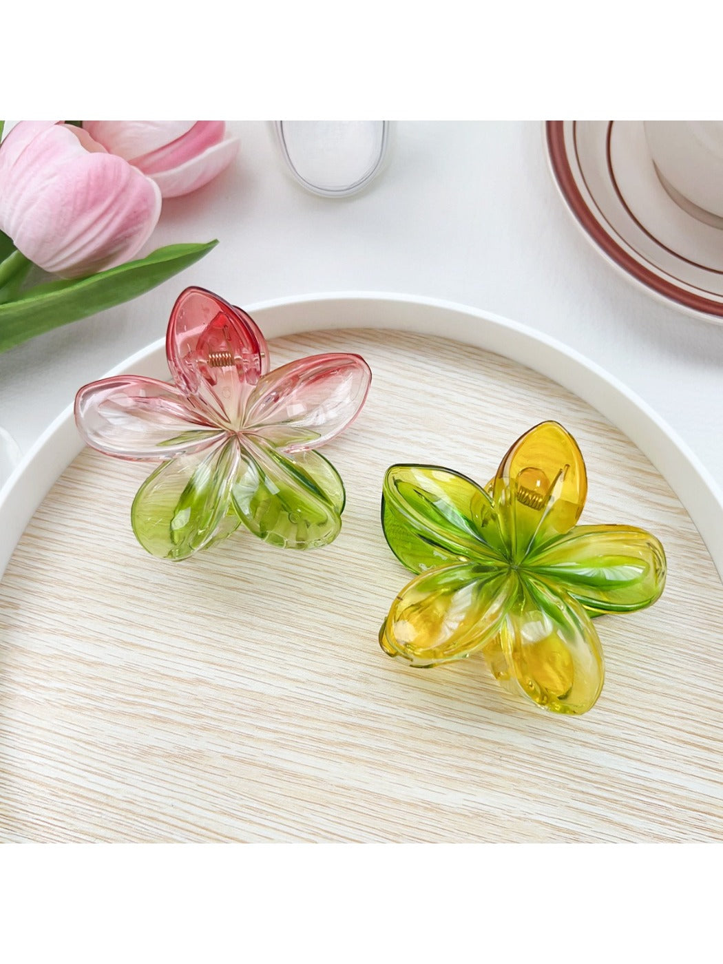 Side view of Beau classic colorful flower claw clip highlighting the clip mechanism