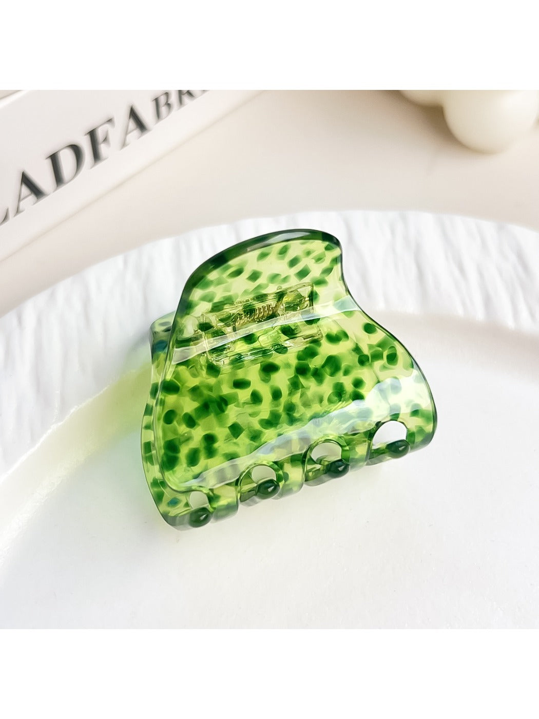 Beau multicolored half moon claw clip with smooth curved edges