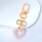 Beaded heart keychain displayed on a white background highlighting colors