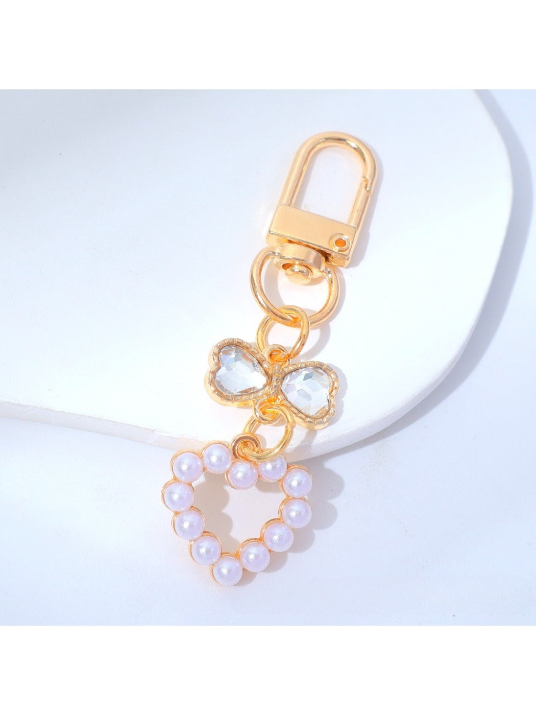 Beaded heart keychain displayed on a white background highlighting colors