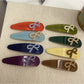 Beau - Bow Embellished Oval Hair Clip