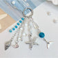 Ocean themed pendant keychain with blue and turquoise enamel and silver key ring