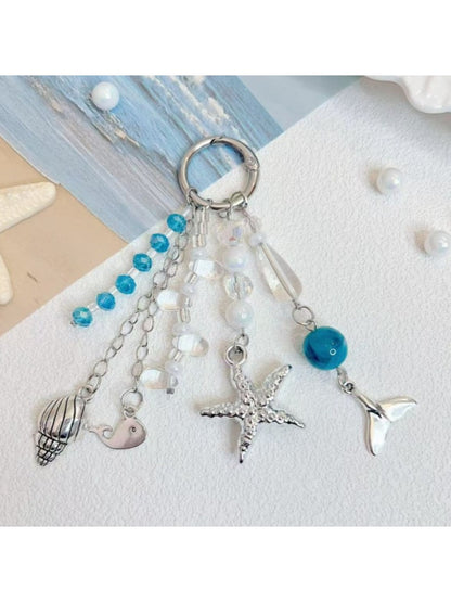 Ocean themed pendant keychain with blue and turquoise enamel and silver key ring