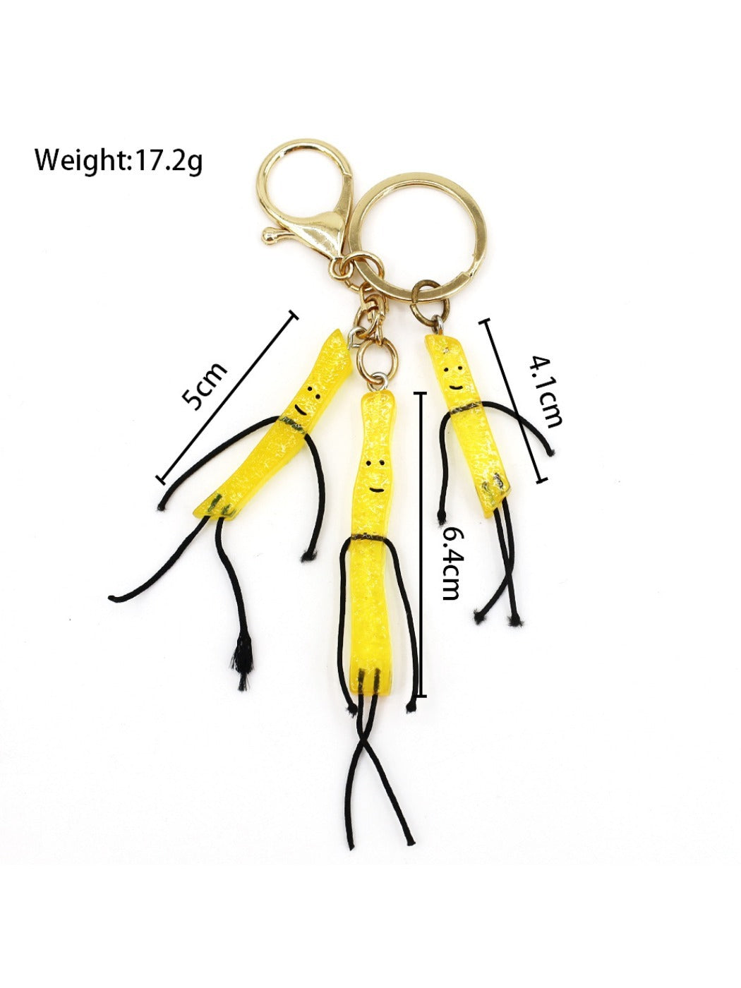 Mini French fries keychain on a keyring with a blurred background