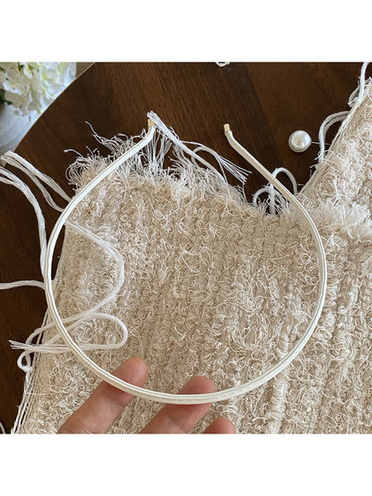 Top view of Gifty minimalist headband highlighting uniform color and shape