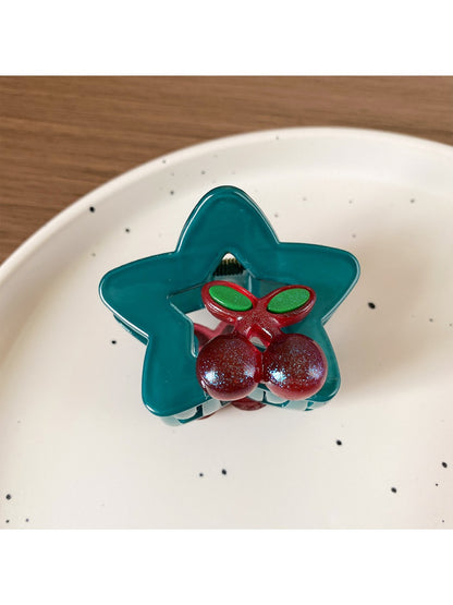 Beau star shaped hair claw clip styled in a half-up hairstyle