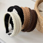 Close-up of Gifty headband showing textured fabric and neat stitching