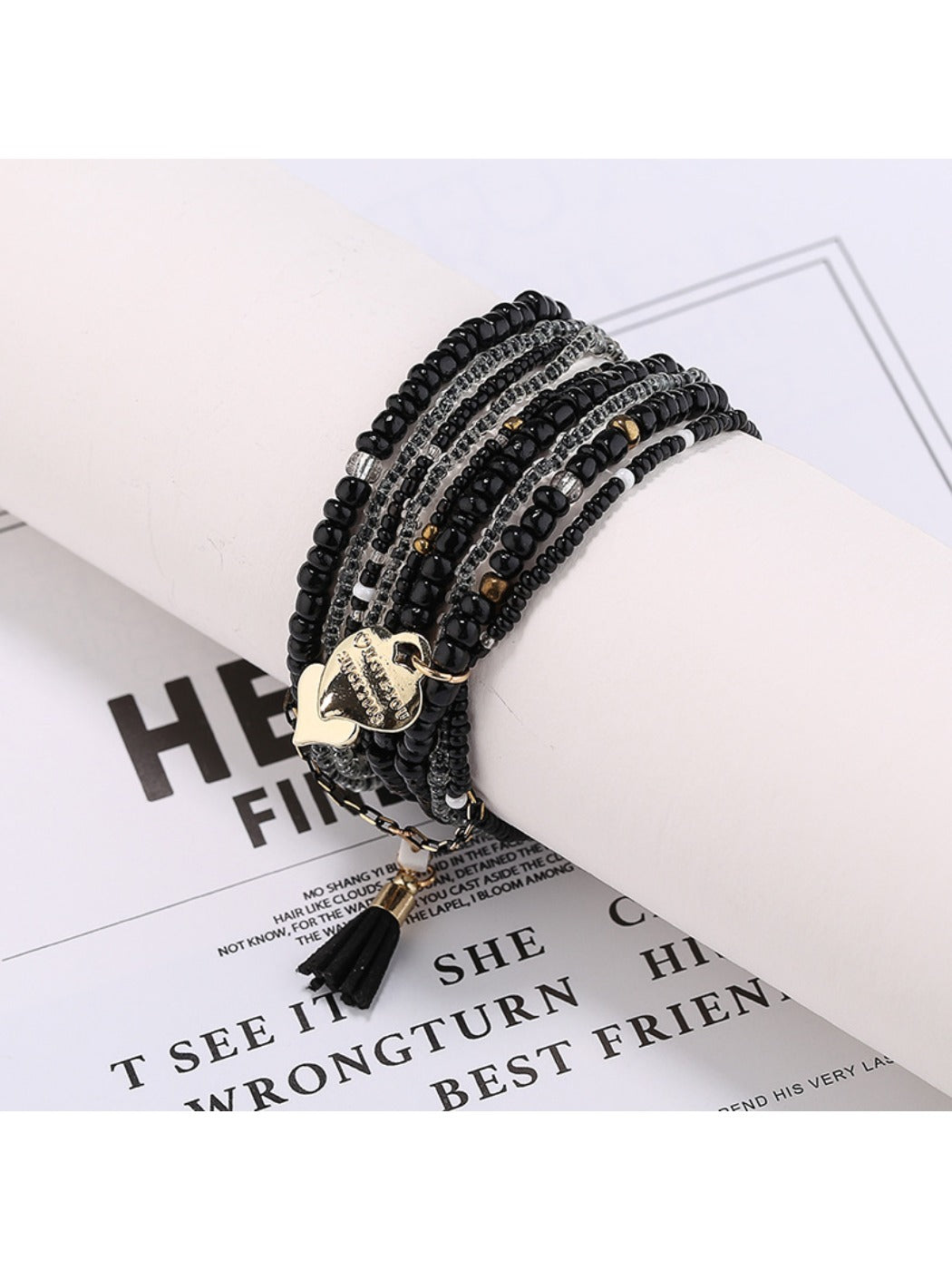 Side view of Lovra heart pendant bracelet showing bead arrangement and clasp