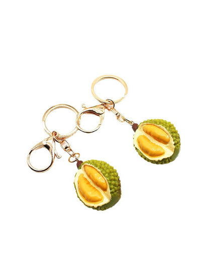 Top view of the durian keychain highlighting the keyring attachment