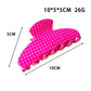 Beau Candy Polka Dot acetate claw clip holding hair in a half-up style