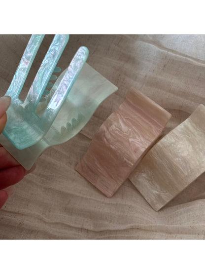 Beau rectangular hair claw clip holding thick hair in place