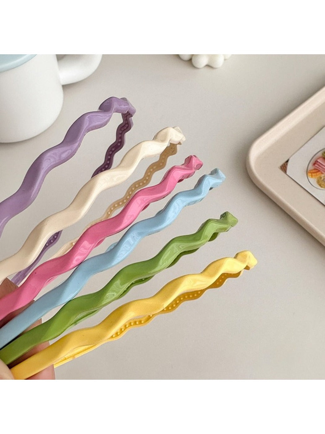 Close-up of Gifty wavy headband showing fabric texture and wave pattern