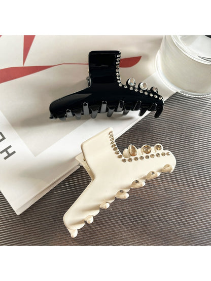 Close-up of rhinestone details on the Beau acetate claw clip