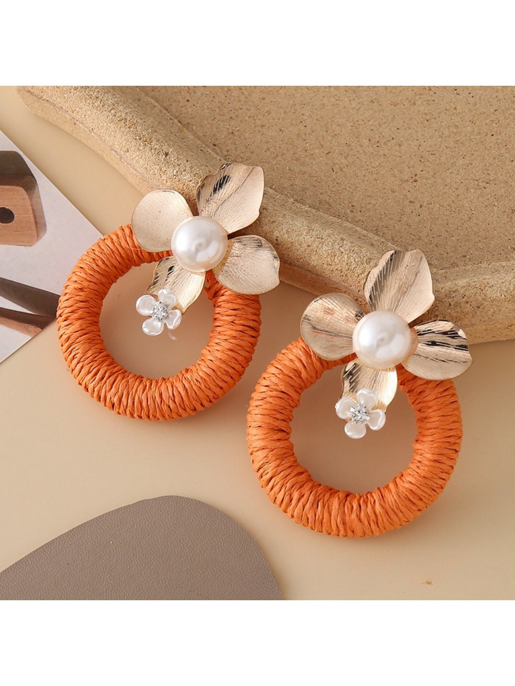 Earedge round floral pendant earrings with gold-tone finish and floral motifs