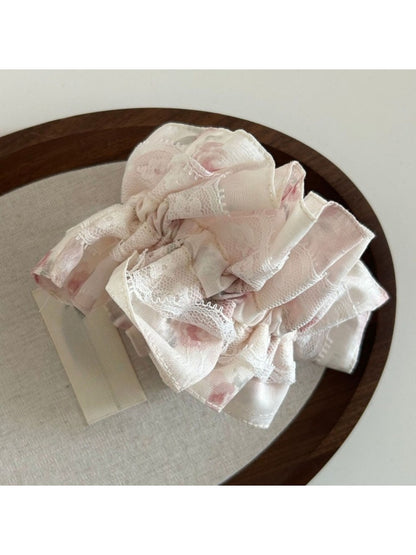 Gifty Sweet Lace Tiny Floral Scrunchie stretched to show elastic band and fabric quality