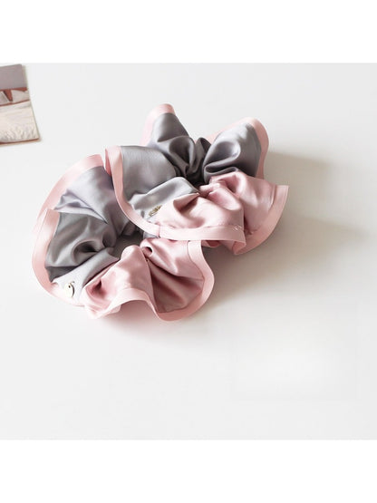 Gifty minimalist scrunchie with modern color blocked design in neutral tones