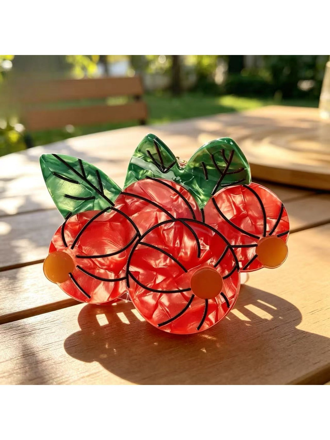 Beau 3D fruit shape claw clip displayed on white background