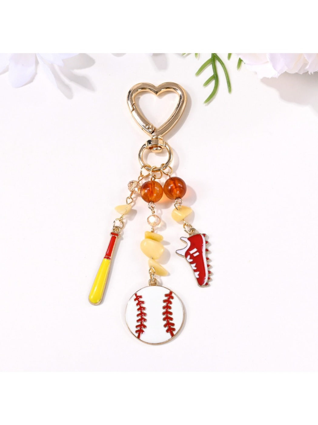 Keypus sports ball keychain hanging from a set of keys