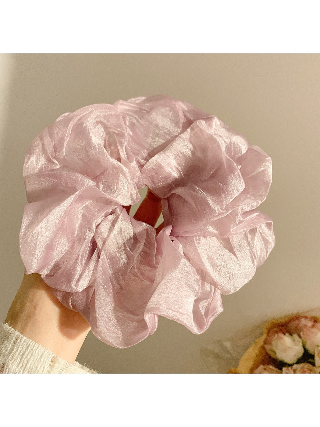 Multiple Gifty scrunchies in different pastel colors arranged together