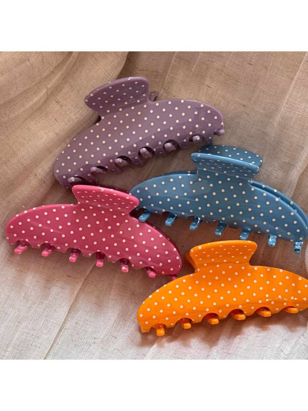 Side view of Beau polka dot hair clip highlighting clip mechanism