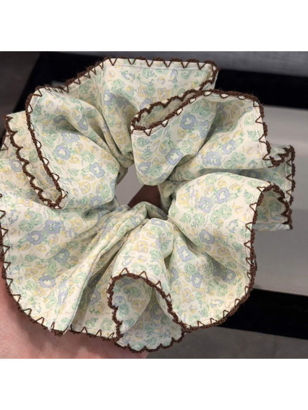 Close-up of Gifty vintage print double layer scrunchie showing fabric texture