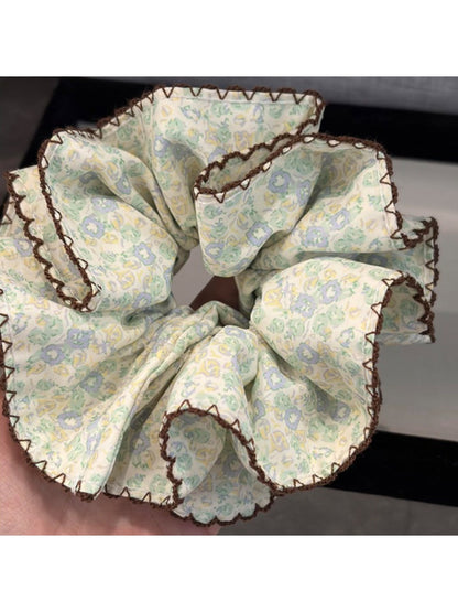 Close-up of Gifty vintage print double layer scrunchie showing fabric texture