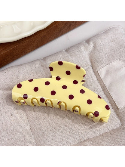 Beau polka dot half circle claw clip clipped in brown hair