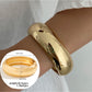 Side view of Lovra polished bracelet highlighting its slim and elegant profile