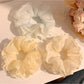 Gifty double layer tulle scrunchie in soft pink on white background