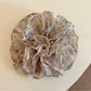 Gifty vintage print ruched scrunchie with floral pattern on fabric